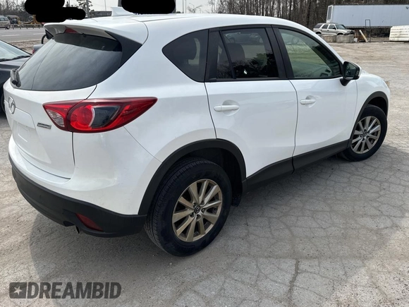 2015 Mazda CX-5 Sport with VIN JM3KE2BE8F0477192, listed as a Copart auction lot 53341745 with 221,042 mi miles and Clean Title. Bid and sale history available at carsss.com. Image 4.