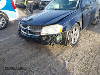 2013 Dodge Avenger SE with VIN 1C3CDZAB1DN665198, listed as a IAAI auction lot 41452523 with 144,249 mi miles. Bid and sale history available at carsss.com. Image 6.
