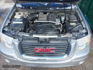 2004 GMC Envoy SLE with VIN 1GKDS13SX42134642, listed as a IAAI auction lot 41715419 with 173,661 mi miles. Bid and sale history available at carsss.com. Image 10.