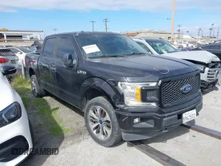 2019 Ford F-150 XL with VIN 1FTEW1EP4KKD73243, listed as a IAAI auction lot 41456076 with 114,198 mi miles. Bid and sale history available at carsss.com. Image 1.