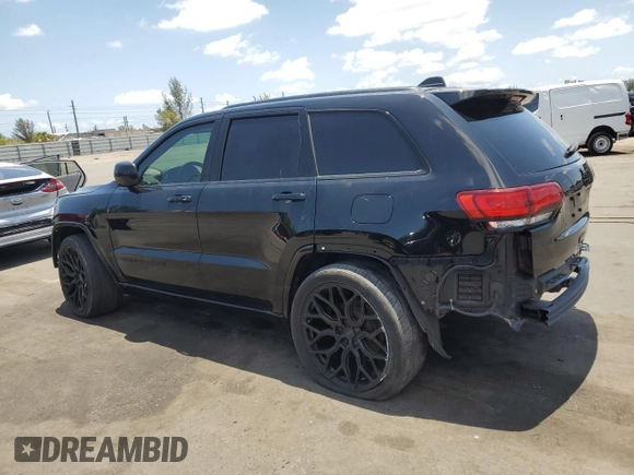 2017 Jeep Grand Cherokee Altitude with VIN 1C4RJEAG3HC952451, listed as a Copart auction lot 55658735 with 92,286 mi miles and Salvage title. Bid and sale history available at DreamBid. Image 2.