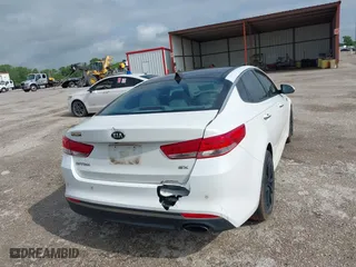 2016 Kia Optima EX with VIN 5XXGU4L38GG013197, listed as a IAAI auction lot 42125301 with 110,128 mi miles. Bid and sale history available at carsss.com. Image 16.