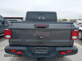 2020 Jeep Gladiator Rubicon with VIN 1C6JJTBG8LL135573, listed as a IAAI auction lot 41585896 with 79,070 mi miles and . Bid and sale history available at DreamBid. Image 16.