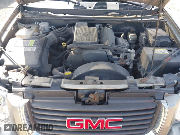 2003 GMC Envoy SLT with VIN 1GKES16S336101568, listed as a IAAI auction lot 40187998 with 185,402 mi miles. Bid and sale history available at carsss.com. Image 10.