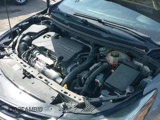 2018 Chevrolet Cruze Premier z VIN 1G1BF5SM1J7159339, wystawiony jako IAAI lot #42283498 z przebiegiem 72 875 mil mil oraz . Historia ofert i sprzedaży dostępna na DreamBid. Obrazek 18.