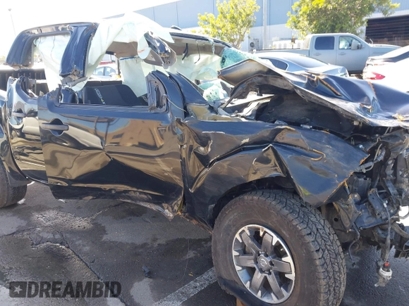 2018 Nissan Frontier SV with VIN 1N6AD0EV0JN733082, listed as a IAAI auction lot 41506210 with Not provided miles and . Bid and sale history available at DreamBid. Image 6.