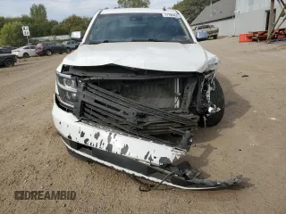 2015 Chevrolet Tahoe LTZ with VIN 1GNSKCKC1FR310018, listed as a Copart auction lot 71798454 with 244,179 mi miles and Salvage title. Bid and sale history available at DreamBid. Image 5.