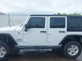 2013 Jeep Wrangler Unlimited Sport with VIN 1C4BJWDG4DL599151, listed as a IAAI auction lot 42212831 with 143,865 mi miles and . Bid and sale history available at DreamBid. Image 14.