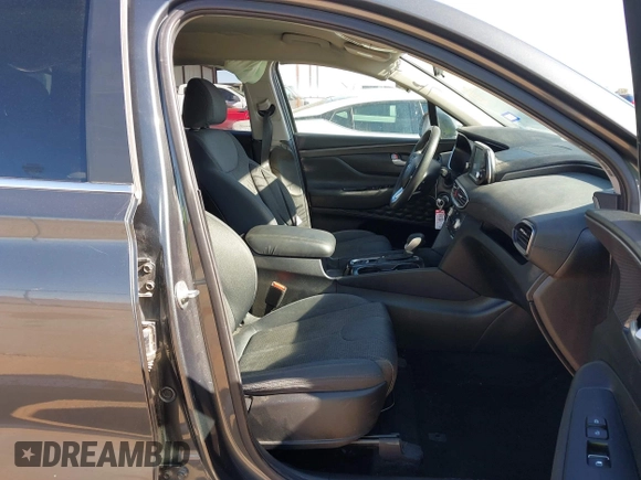 2019 Hyundai Santa Fe SE with VIN 5NMS23AD2KH134016, listed as a IAAI auction lot 41977240 with 61,448 mi miles and . Bid and sale history available at DreamBid. Image 5.