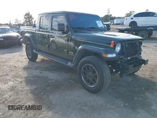 2023 Jeep Gladiator Overland z VIN 1C6HJTFG9PL507484, wystawiony jako IAAI lot #41486457 z przebiegiem 54 871 mil mil oraz . Historia ofert i sprzedaży dostępna na DreamBid. Obrazek 1.