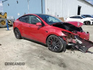 2023 Tesla Model Y Performance z VIN 7SAYGDEF2PF591238, wystawiony jako Copart lot #51991025 z przebiegiem 44 749 mil mil oraz Szkoda całkowita • Salvage title. Historia ofert i sprzedaży dostępna na DreamBid. Obrazek 4.