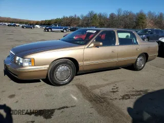 1998 Cadillac DeVille DHS z VIN 1G6KE54Y5WU711754, wystawiony jako Copart lot #80521654 z przebiegiem 59 044 mil mil oraz Czysty tytuł • Clean title. Historia ofert i sprzedaży dostępna na DreamBid. Obrazek 1.