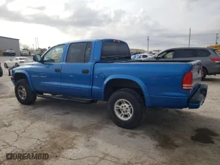 2000 Dodge Dakota Sport with VIN 1B7GG2AN0YS699193, listed as a Copart auction lot 51438325 with 127,106 mi miles and Salvage Title. Bid and sale history available at carsss.com. Image 2.