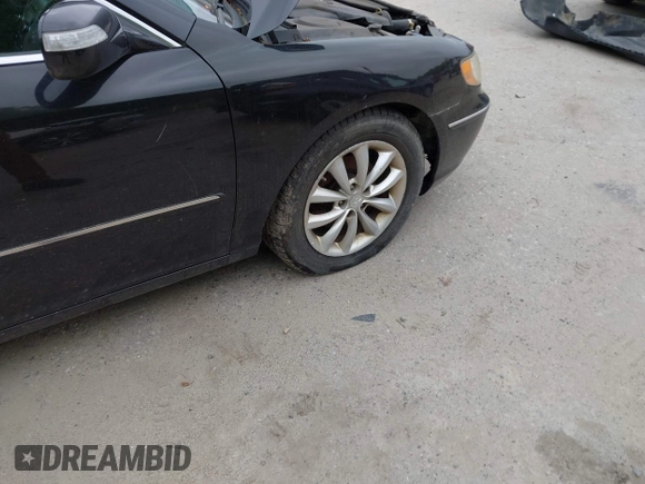 2007 Hyundai Azera SE z VIN KMHFC46F67A244191, wystawiony jako IAAI lot #42273775 z przebiegiem 178 713 mil mil oraz . Historia ofert i sprzedaży dostępna na DreamBid. Obrazek 16.