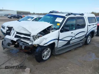 2002 Ford Explorer Sport Trac Value z VIN 1FMZU77E42UC81703, wystawiony jako IAAI lot #42091104 z przebiegiem 232 563 mil mil oraz . Historia ofert i sprzedaży dostępna na DreamBid. Obrazek 2.