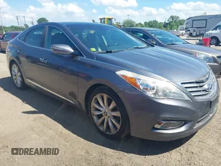 2012 Hyundai Azera z VIN KMHFH4JGXCA174819, wystawiony jako IAAI lot #42579424 z przebiegiem 160 896 mil mil oraz . Historia ofert i sprzedaży dostępna na DreamBid. Obrazek 1.