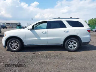 2012 Dodge Durango SXT z VIN 1C4RDJAG0CC294998, wystawiony jako IAAI lot #42230396 z przebiegiem 62 963 mil mil oraz . Historia ofert i sprzedaży dostępna na DreamBid. Obrazek 14.