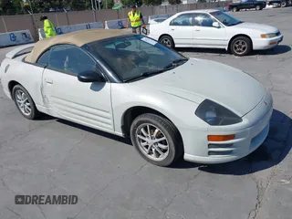 2001 Mitsubishi Eclipse GS z VIN 4A3AE45G41E051327, wystawiony jako IAAI lot #42472333 z przebiegiem 105 308 mil mil oraz . Historia ofert i sprzedaży dostępna na DreamBid. Obrazek 1.