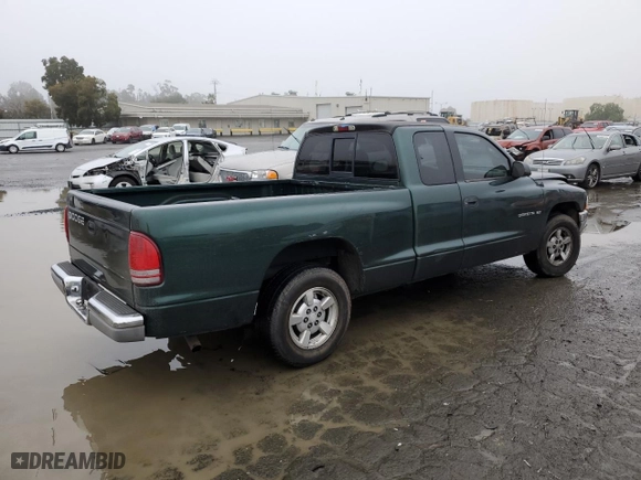 2002 Dodge Dakota SLT with VIN 1B7GL42X52S528521, listed as a Copart auction lot 85598784 with 168,740 mi miles and Salvage Title. Bid and sale history available at carsss.com. Image 3.