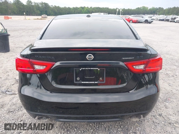 2018 Nissan Maxima Platinum z VIN 1N4AA6AP9JC392479, wystawiony jako IAAI lot #42209148 z przebiegiem 103 710 mil mil oraz . Historia ofert i sprzedaży dostępna na DreamBid. Obrazek 16.