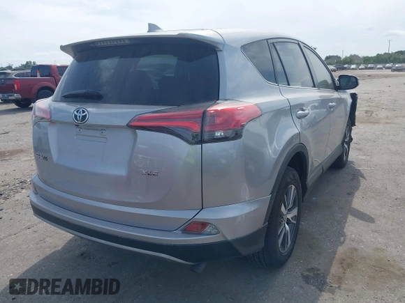 2018 Toyota RAV4 XLE z VIN 2T3WFREV5JW466294, wystawiony jako IAAI lot #41841436 z przebiegiem 132 150 mil mil oraz . Historia ofert i sprzedaży dostępna na DreamBid. Obrazek 4.