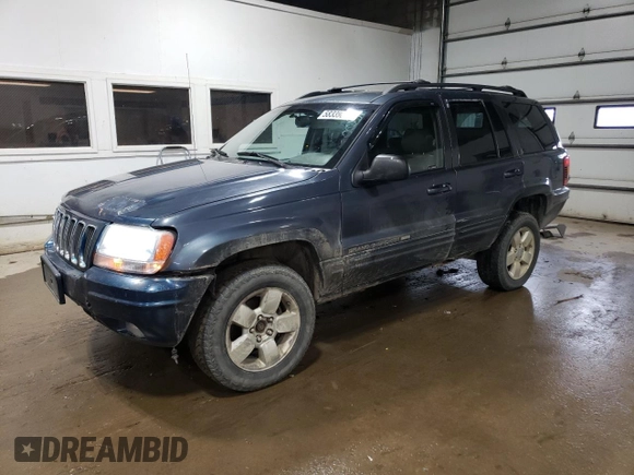 2001 Jeep Grand Cherokee Limited with VIN 1J4GW58N01C664996, listed as a Copart auction lot 58339825 with 288,153 mi miles and Salvage title. Bid and sale history available at DreamBid. Image 1.