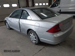 2003 Honda Civic LX with VIN 1HGEM22503L014323, listed as a IAAI auction lot 41505901 with 157,969 mi miles. Bid and sale history available at carsss.com. Image 3.
