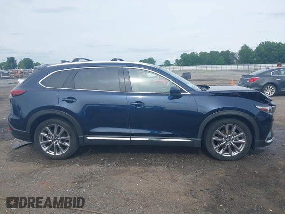 2020 Mazda CX-9 Grand Touring with VIN JM3TCBDY1L0402718, listed as a IAAI auction lot 42355511 with 87,205 mi miles and . Bid and sale history available at DreamBid. Image 13.