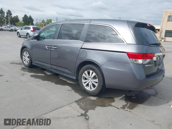 2016 Honda Odyssey EX-L with VIN 5FNRL5H68GB104350, listed as a IAAI auction lot 42023306 with 124,672 mi miles. Bid and sale history available at carsss.com. Image 3.