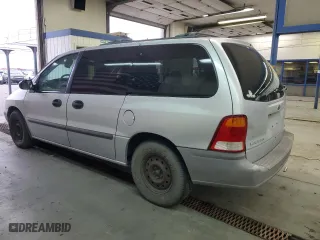 2000 Ford Windstar Wagon LX with VIN 2FMZA5149YBA21339, listed as a Copart auction lot 83040384 with 136,958 mi miles and Clean Title. Bid and sale history available at carsss.com. Image 2.