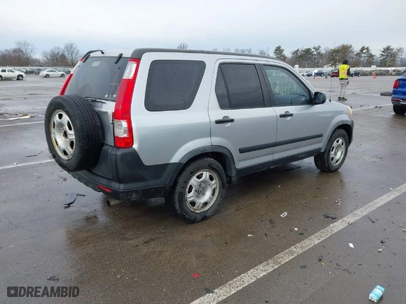2005 Honda CR-V LX with VIN JHLRD68565C010541, listed as a IAAI auction lot 41660510 with 179,174 mi miles. Bid and sale history available at carsss.com. Image 4.