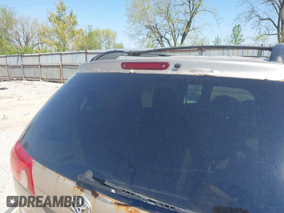 2009 Toyota Sienna XLE with VIN 5TDZK22CX9S257522, listed as a IAAI auction lot 42113875 with 214,873 mi miles. Bid and sale history available at carsss.com. Image 15.