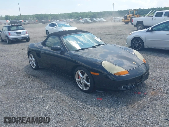 2002 Porsche Boxster S z VIN WP0CB29842U663272, wystawiony jako IAAI lot #42604562 z przebiegiem 68 927 mil mil oraz . Historia ofert i sprzedaży dostępna na DreamBid. Obrazek 1.