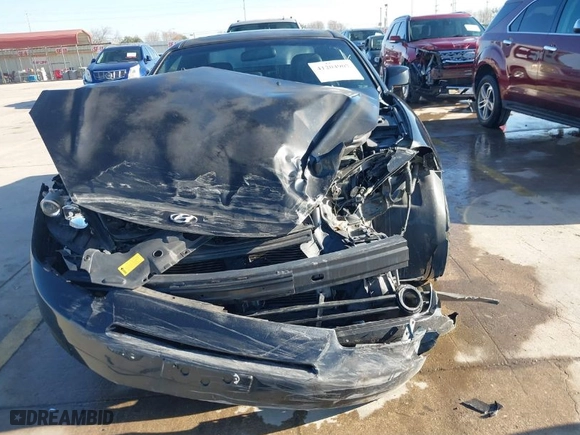 2007 Hyundai Tiburon GT with VIN KMHHN66F87U259322, listed as a IAAI auction lot 41204907 with 79,379 mi miles. Bid and sale history available at carsss.com. Image 12.