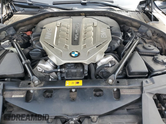 2011 BMW 7 Series with VIN WBAKX8C52BC198377, listed as a Copart auction lot 70003444 with 173,725 mi miles and Salvage title. Bid and sale history available at DreamBid. Image 11.