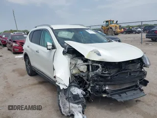 2017 Nissan Rogue SV z VIN 5N1AT2MT1HC848101, wystawiony jako IAAI lot #41944456 z przebiegiem 52 294 mil mil oraz . Historia ofert i sprzedaży dostępna na DreamBid. Obrazek 1.