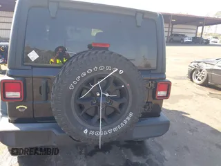 2021 Jeep Wrangler Unlimited Sport S with VIN 1C4HJXDN6MW812565, listed as a IAAI auction lot 41506140 with 27,273 mi miles and . Bid and sale history available at DreamBid. Image 16.