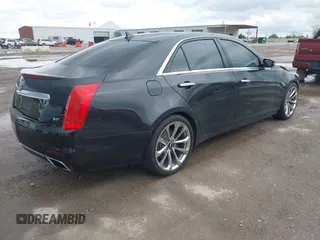 2014 Cadillac CTS Vsport Premium RWD z VIN 1G6AV5S89E0148907, wystawiony jako IAAI lot #41880678 z przebiegiem 148 052 mil mil oraz . Historia ofert i sprzedaży dostępna na DreamBid. Obrazek 4.