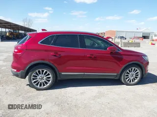 2015 Lincoln MKC with VIN 5LMCJ1A93FUJ30944, listed as a IAAI auction lot 41835261 with 142,324 mi miles. Bid and sale history available at carsss.com. Image 13.