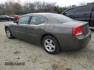2010 Dodge Charger SXT with VIN 2B3CA3CV5AH187124, listed as a Copart auction lot 49622545 with 247,235 mi miles and Salvage Title. Bid and sale history available at carsss.com. Image 2.