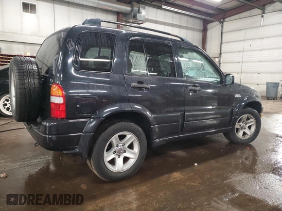 2003 Suzuki Grand Vitara z VIN JS3TD62V234100175, wystawiony jako Copart lot #47174605 z przebiegiem 88 451 mil mil oraz Szkody całkowita. Historia ofert i sprzedaży dostępna na DreamBid. Obrazek 3.