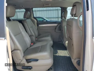 2012 Volkswagen Routan SE z VIN 2C4RVABG7CR391702, wystawiony jako Copart lot #57144765 z przebiegiem 97 122 mil mil oraz Szkoda całkowita • Salvage title. Historia ofert i sprzedaży dostępna na DreamBid. Obrazek 11.