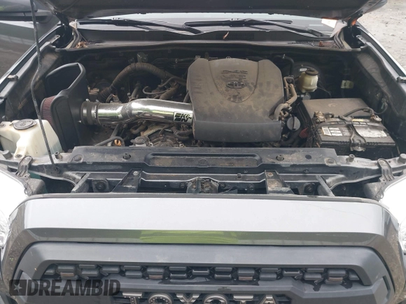 2017 Toyota Tacoma SR5 z VIN 3TMAZ5CN9HM044182, wystawiony jako IAAI lot #42116303 z przebiegiem 92 577 mil mil oraz . Historia ofert i sprzedaży dostępna na DreamBid. Obrazek 10.