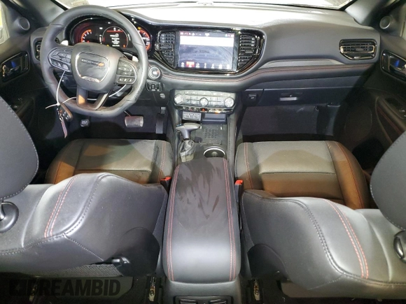 2025 Dodge Durango GT Plus with VIN 1C4RDJDG5SC506983, listed as a Copart auction lot 82427384 with 1,404 mi miles and Salvage title. Bid and sale history available at DreamBid. Image 8.