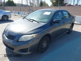 2010 Toyota Corolla with VIN 2T1BU4EE4AC489972, listed as a IAAI auction lot 41955399 with 139,270 mi miles. Bid and sale history available at carsss.com. Image 6.