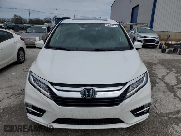 2020 Honda Odyssey Touring with VIN 5FNRL6H8XLB019365, listed as a Copart auction lot 52404335 with 59,486 mi miles and Salvage Title. Bid and sale history available at DreamBid. Image 5.