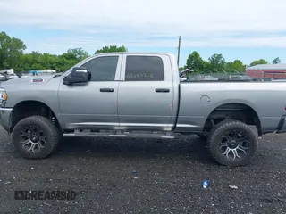 2023 Ram 2500 Tradesman with VIN 3C6UR5CJXPG590942, listed as a IAAI auction lot 42587742 with 76,595 mi miles and . Bid and sale history available at DreamBid. Image 14.