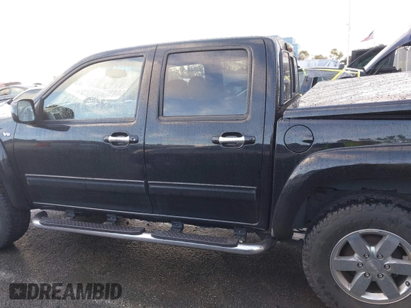 2010 GMC Canyon z VIN 1GTJSFDP6A8134412, wystawiony jako IAAI lot #41589150 z przebiegiem 164 232 mil mil oraz . Historia ofert i sprzedaży dostępna na DreamBid. Obrazek 14.