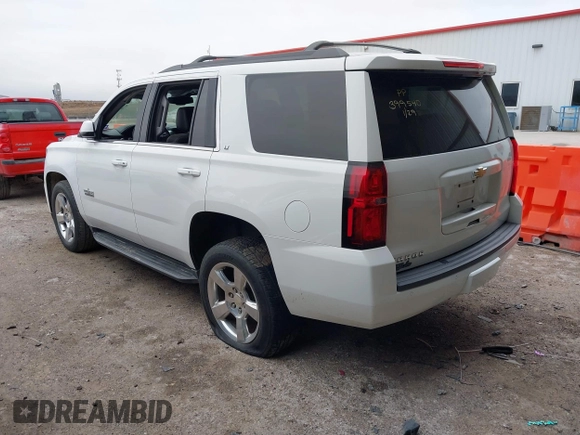 2018 Chevrolet Tahoe LT with VIN 1GNSCBKC3JR138624, listed as a IAAI auction lot 41483062 with 80,107 mi miles and . Bid and sale history available at DreamBid. Image 3.