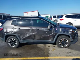 2018 Jeep Compass Trailhawk with VIN 3C4NJDDB3JT231923, listed as a IAAI auction lot 41929198 with 129,001 mi miles and . Bid and sale history available at carsss.com. Image 13.